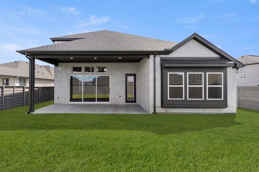 Exterior details and patio area of a home in Discovery Collection at Union Park, Little Elm (Image 4). Exterior details and patio area of a home in Discovery Collection at Union Park, Little Elm (Image 4).