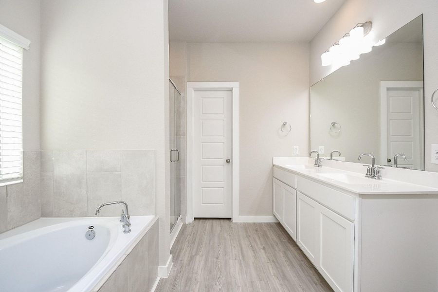 Furnished interior view inside a new home in Marvida, Cypress (Image 10).