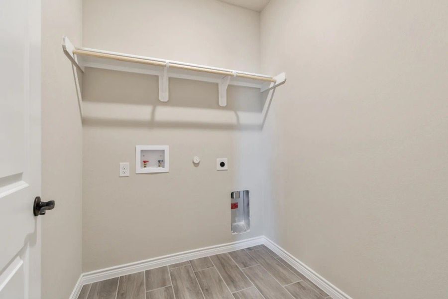 Laundry Room | Concept 2440 at Hulen Trails in Fort Worth, TX by Landsea Homes