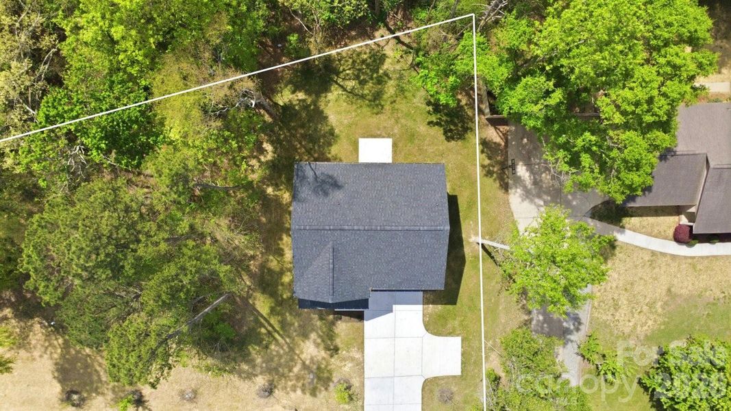 Front exterior of a new home in , Charlotte, NC, highlighting curb appeal (Image 23).