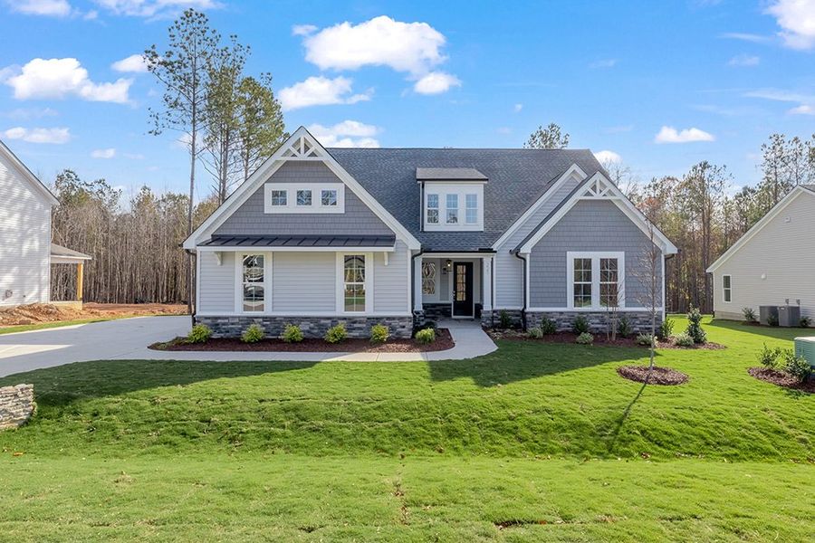 Representative exterior photo of a completed home built from the The Bradley by RobuckHomes in Baylee Ridge, Selma, NC (Image 32). Representative exterior photo of a completed home built from the The Bradley by RobuckHomes in Baylee Ridge, Selma, NC (Image 32).