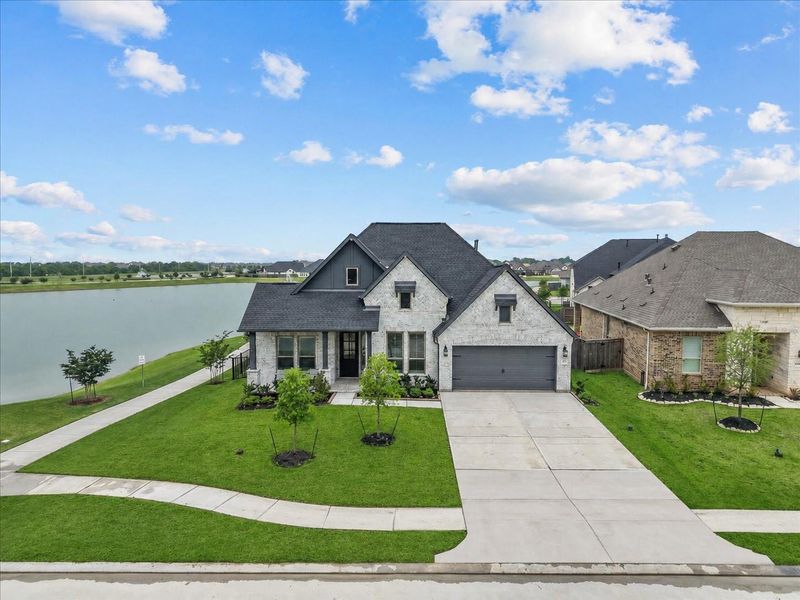 Stunning single-story home loaded with upgrades. 4 bedroom, 4 full bath home situated on a premium waterfront lot.