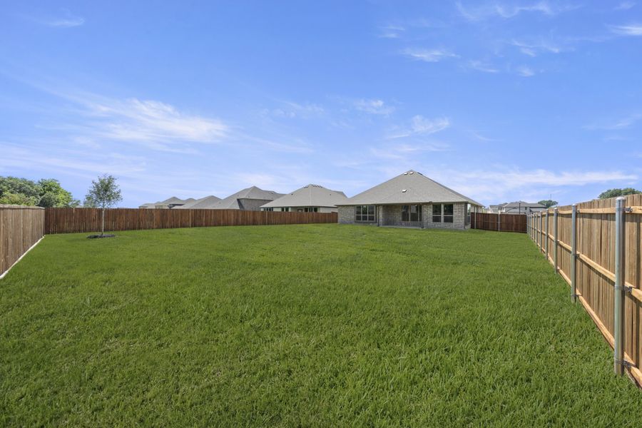 Exterior details and patio area of a home in Lovers Landing, Forney (Image 19).