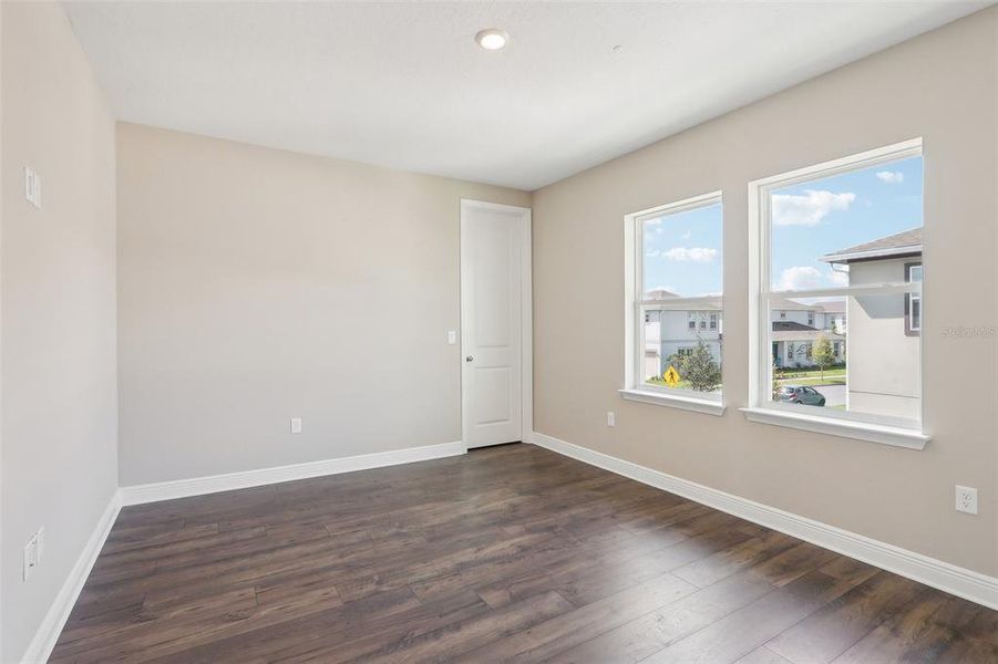 Spacious, unfurnished interior of a new home in Laureate Park, Orlando (Image 34).