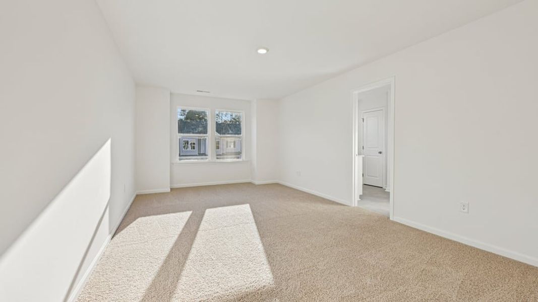 Spacious, unfurnished interior of a new home in Chapel Townes, Raleigh (Image 21).