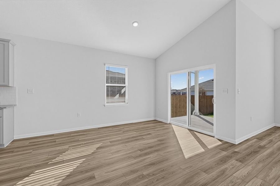 Representative unfurnished interior of a home built from the Warbler by Taylor Morrison in Longview, Del Valle (Image 8).