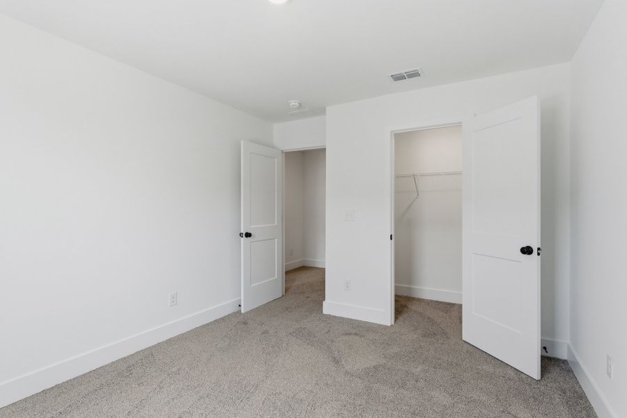 A room with white doors.