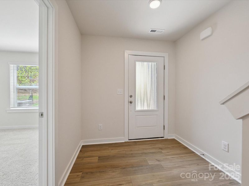 Spacious, unfurnished interior of a new home in Central Living at Craig, Charlotte (Image 19).