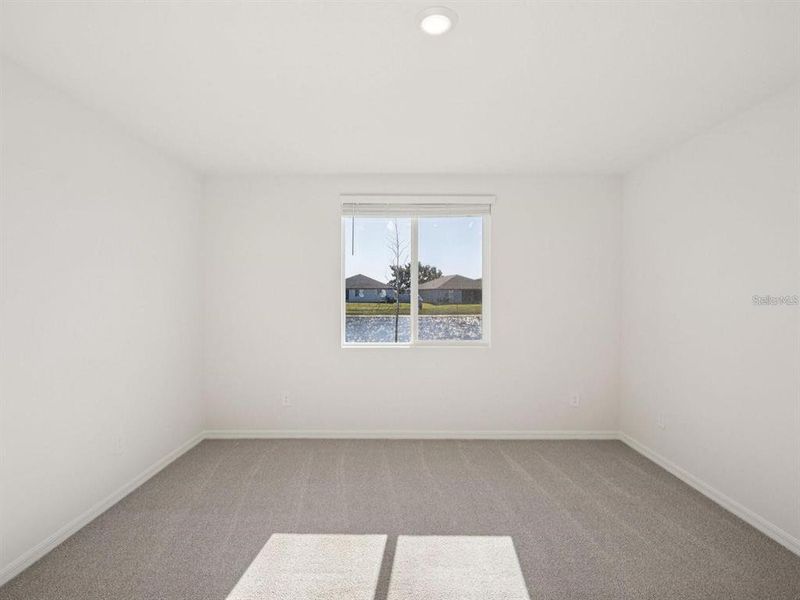 Spacious, unfurnished interior of a new home in The Grove at Stuart Crossing - Classic Series, Bartow (Image 11). Spacious, unfurnished interior of a new home in The Grove at Stuart Crossing - Classic Series, Bartow (Image 11).