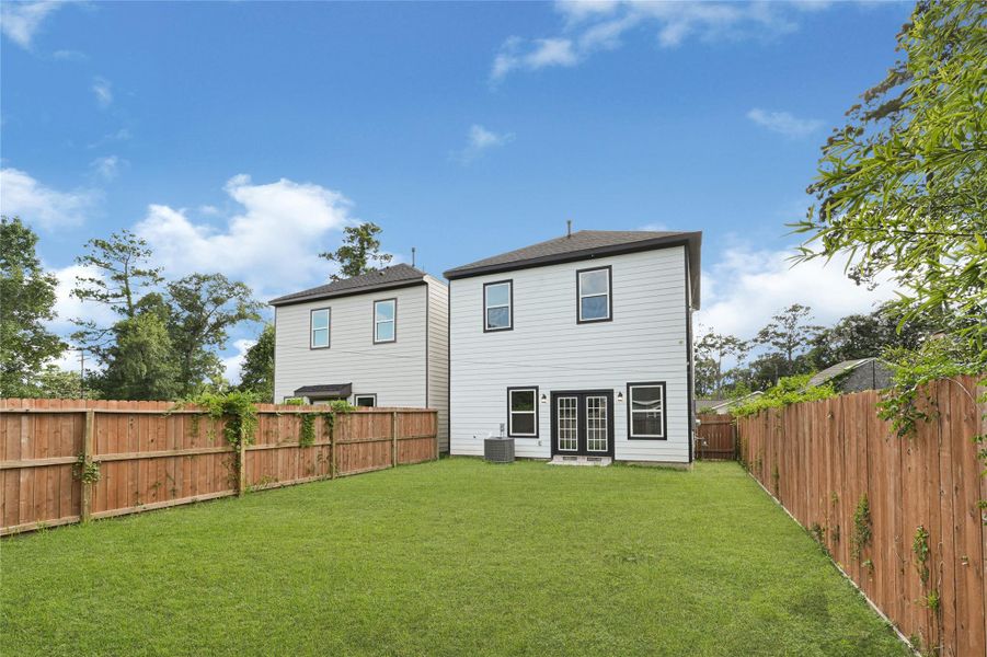 Exterior details and patio area of a home in , Houston (Image 3).