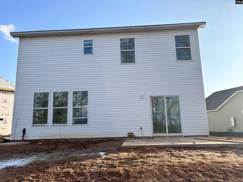 Exterior details and patio area of a home in Rolling Hills, Prosperity (Image 3).
