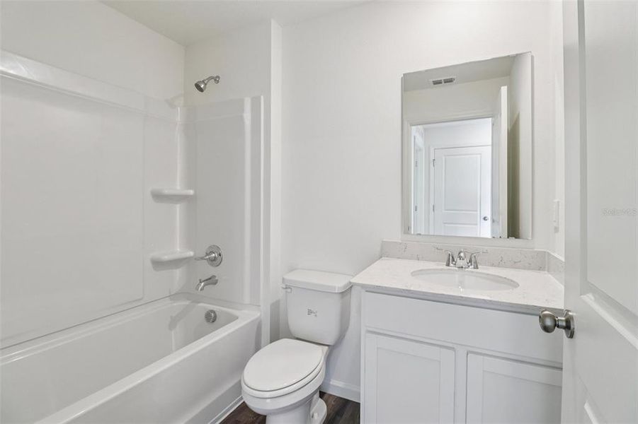 Furnished interior view inside a new home in Sumter Villas, Sumterville (Image 9).