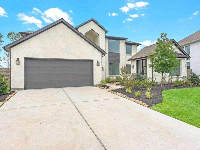 Representative exterior photo of a completed home built from the The Calistoga by Westin Homes in ARTAVIA® - 65' Art Collection, Conroe, TX (Image 14). Representative exterior photo of a completed home built from the The Calistoga by Westin Homes in ARTAVIA® - 65' Art Collection, Conroe, TX (Image 14).
