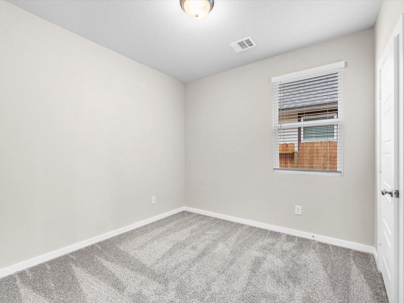 Spacious, unfurnished interior of a new home in Montgomery Oaks - Premier, Conroe (Image 25).