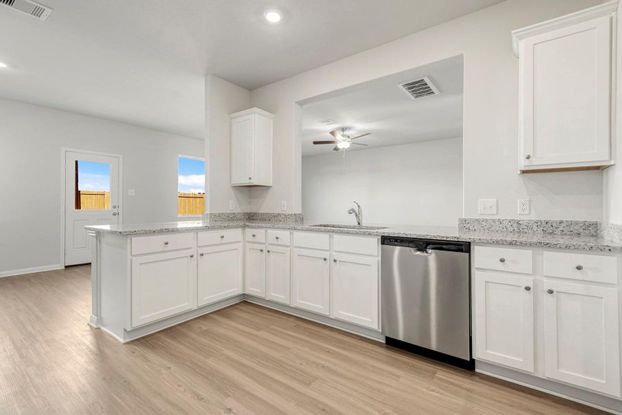 Furnished interior view inside a new home in Cypress Trails at Bauer Landing, Hockley (Image 5).
