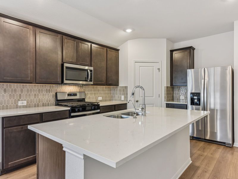 Furnished interior view inside a new home in Riverbend at Double Eagle - Reserve Collection, Cedar Creek (Image 4).
