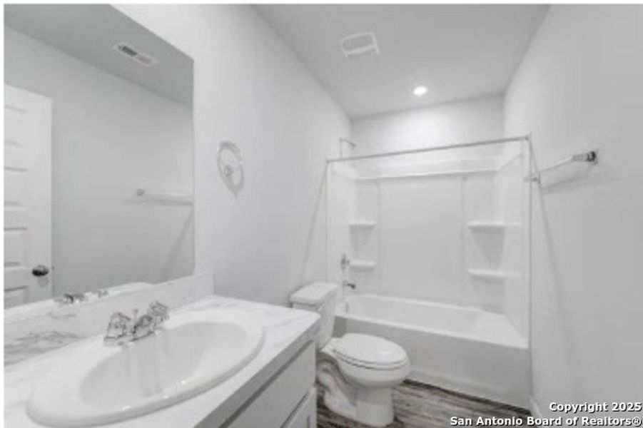 Furnished interior view inside a new home in Las Colinas, Kenedy (Image 7).