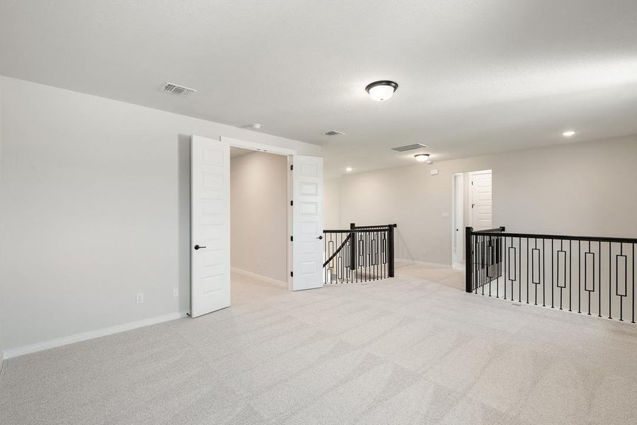 Spacious, unfurnished interior of a new home in Park Collection At Wolf Ranch, Georgetown (Image 24).