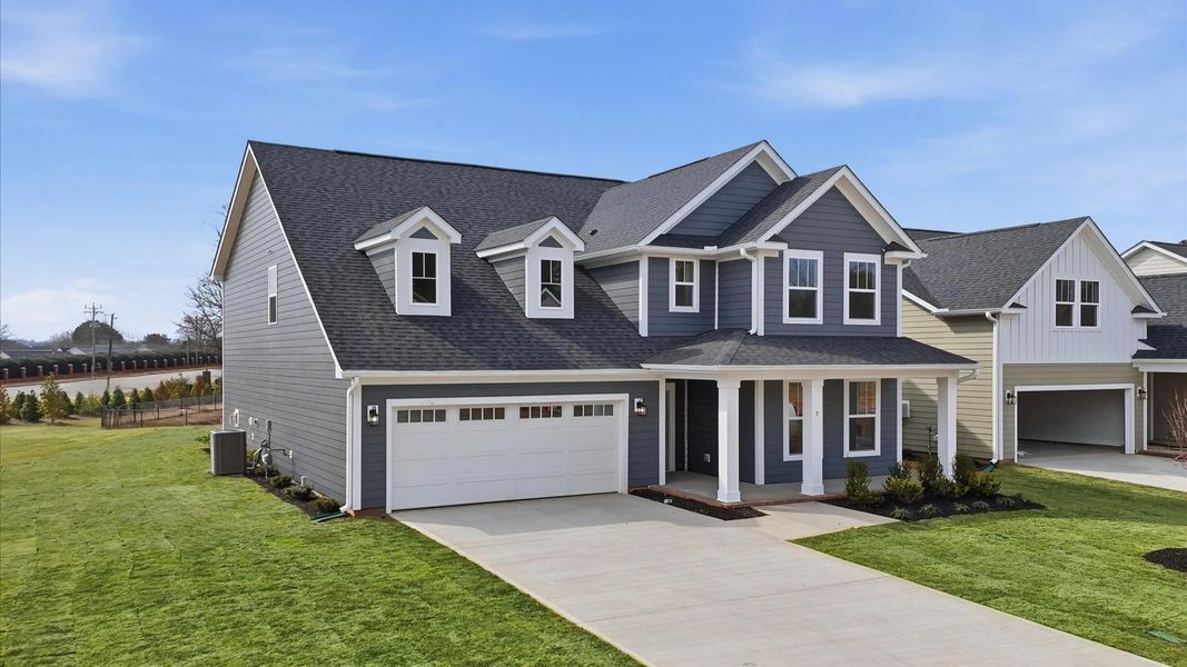 Front exterior of a new home in Pelham Crossing, Greenville, SC, highlighting curb appeal (Image 20).