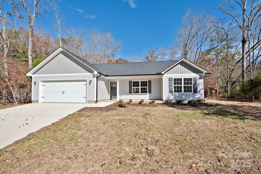 Front exterior of a new home in , Mount Gilead, NC, highlighting curb appeal (Image 18).
