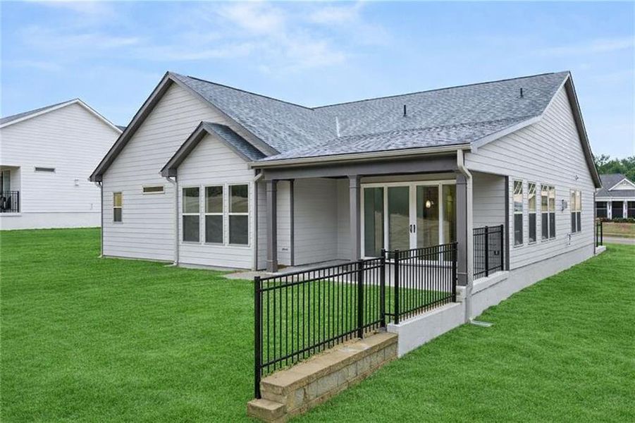 Exterior details and patio area of a home in Soleil Belmont Park, Canton (Image 28).