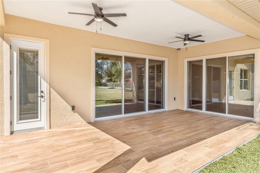 Exterior details and patio area of a home in , Orange City (Image 3).