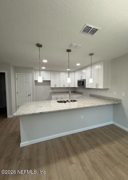 Furnished interior view inside a new home in , Jacksonville (Image 40).