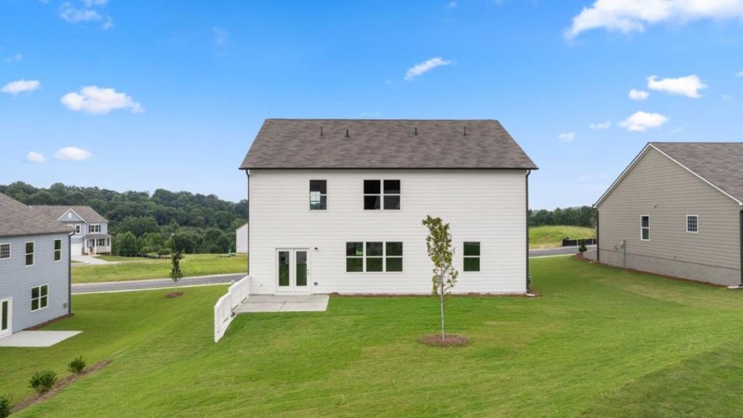 Exterior details and patio area of a home in Liberty Crossing, Braselton (Image 3).
