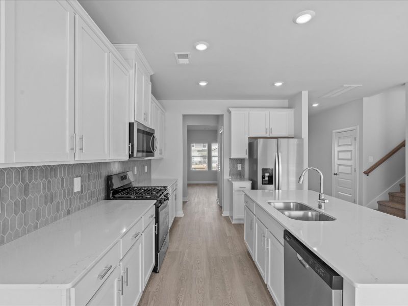 Furnished interior view inside a new home in The Farm at Wells Creek - Signature Collection, Gray Court (Image 5).