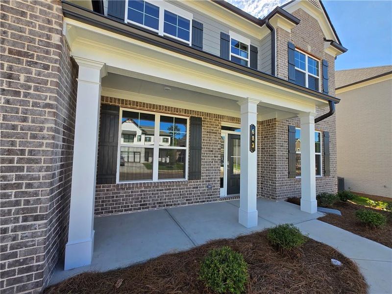 Exterior details and patio area of a home in Pinecrest Ridge, Dacula (Image 21). Exterior details and patio area of a home in Pinecrest Ridge, Dacula (Image 21).