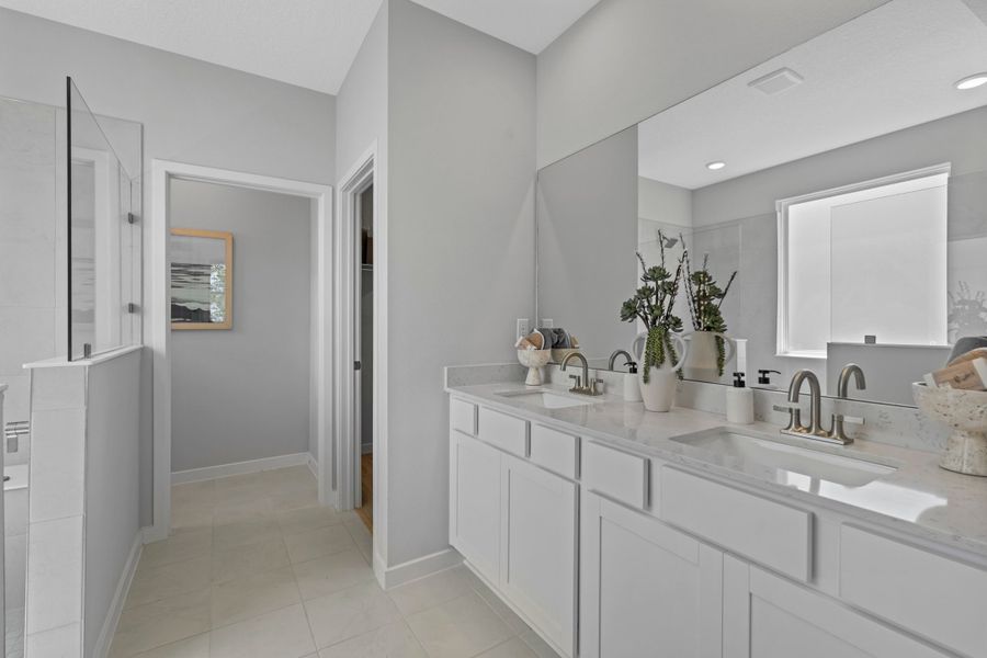 Coronado Model Home Primary Bathroom with Super Shower at Reserve East in Flagler Beach Coronado Model Home Primary Bathroom with Super Shower at Reserve East in Flagler Beach