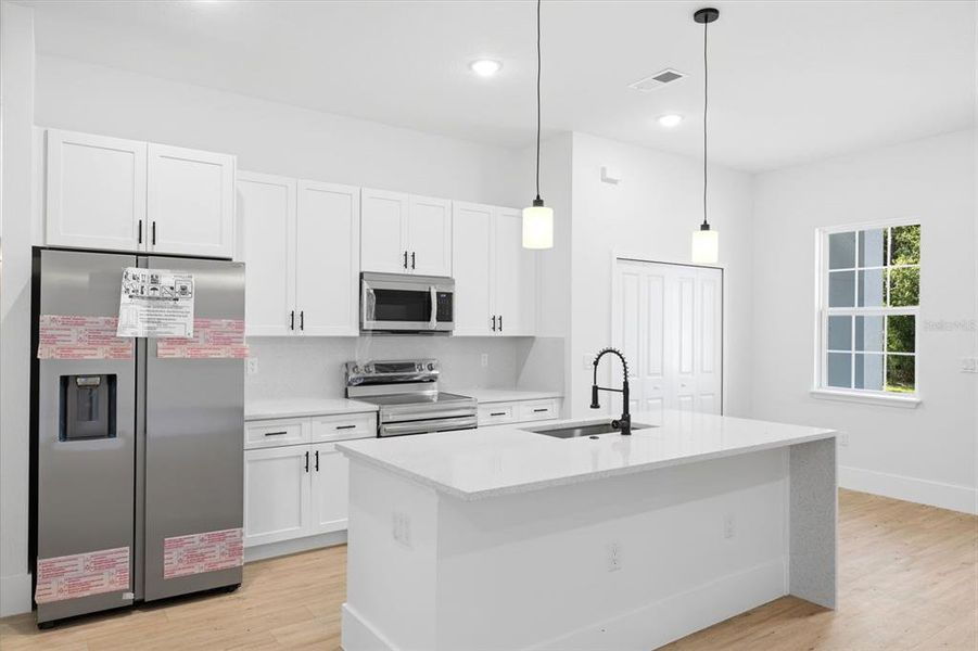 Furnished interior view inside a new home in , Ocala (Image 8).