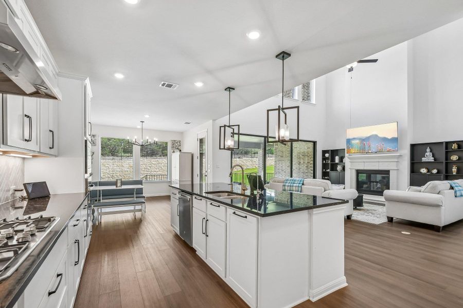 An open concept design unites a functional kitchen with the inviting living area, creating an ideal space for daily life.