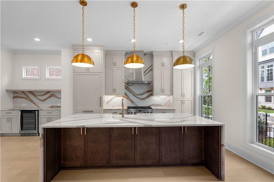 GREAT CABINETRY (EVEN UNDER THE ISLAND) AND THE CUSTOM BUILT IN REFRIGERATOR IS SEAMLESS WITH THE MATCHING CABINET PANELS GREAT CABINETRY (EVEN UNDER THE ISLAND) AND THE CUSTOM BUILT IN REFRIGERATOR IS SEAMLESS WITH THE MATCHING CABINET PANELS