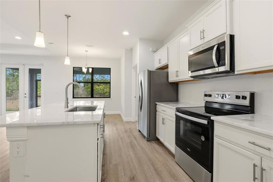 Furnished interior view inside a new home in , North Port (Image 8).