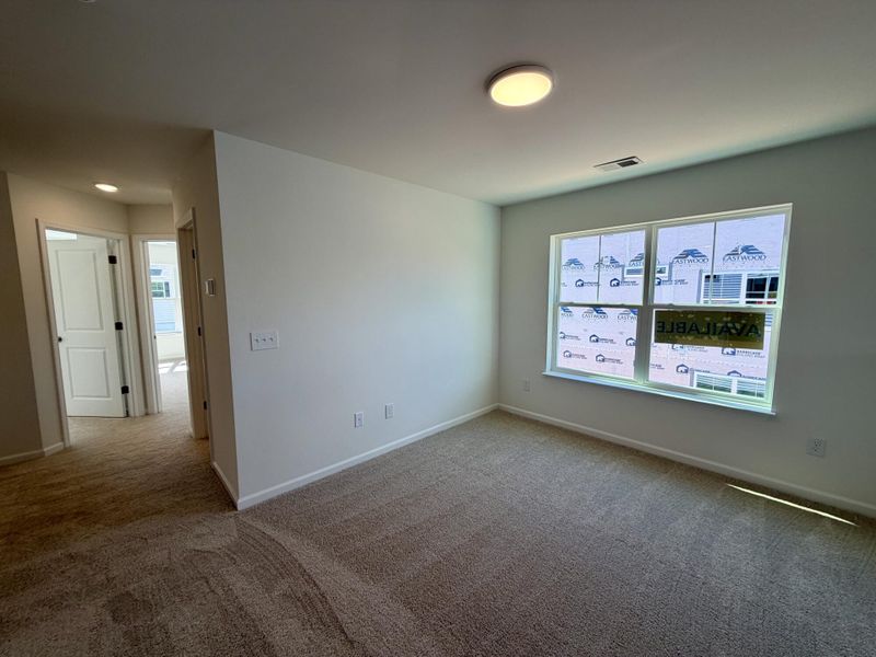 Spacious, unfurnished interior of a new home in Bellevue Townhomes, Greenville (Image 16).