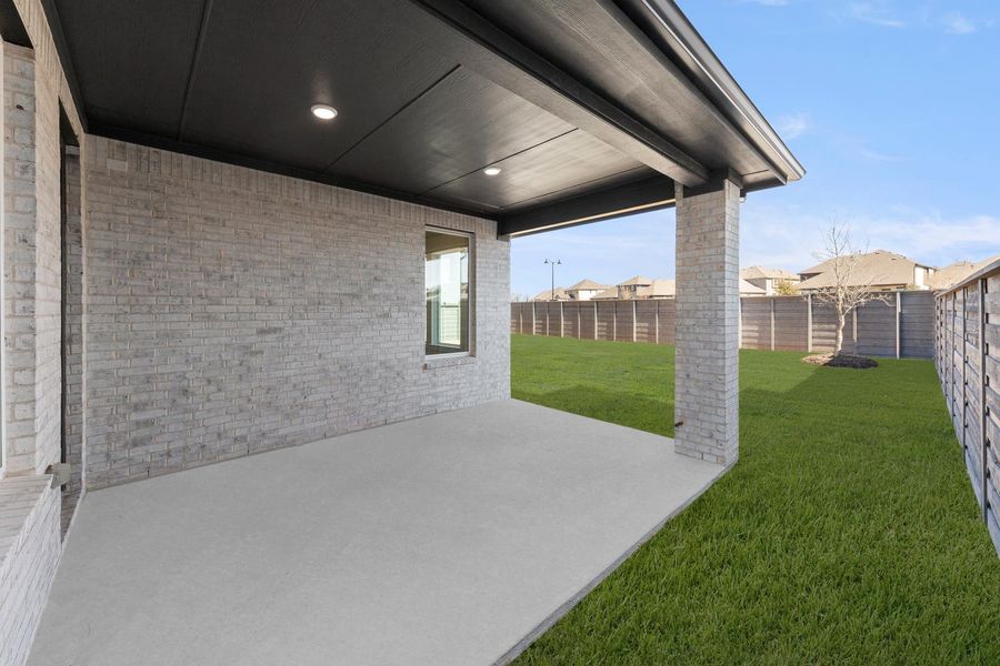 Exterior details and patio area of a home in Union Park, Little Elm (Image 4). Exterior details and patio area of a home in Union Park, Little Elm (Image 4).