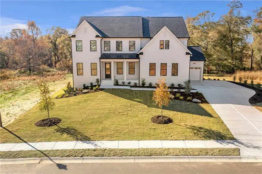 Front exterior of a new home in , Bogart, GA, highlighting curb appeal (Image 25).