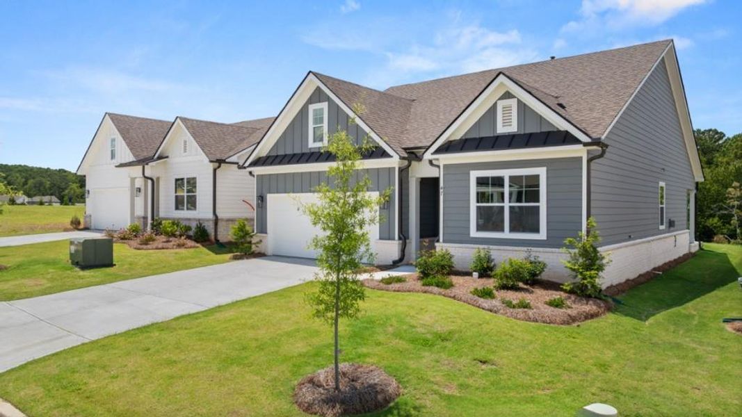 Front exterior of a new home in Hamptons at Riverwood North, Dallas, GA, highlighting curb appeal (Image 14).