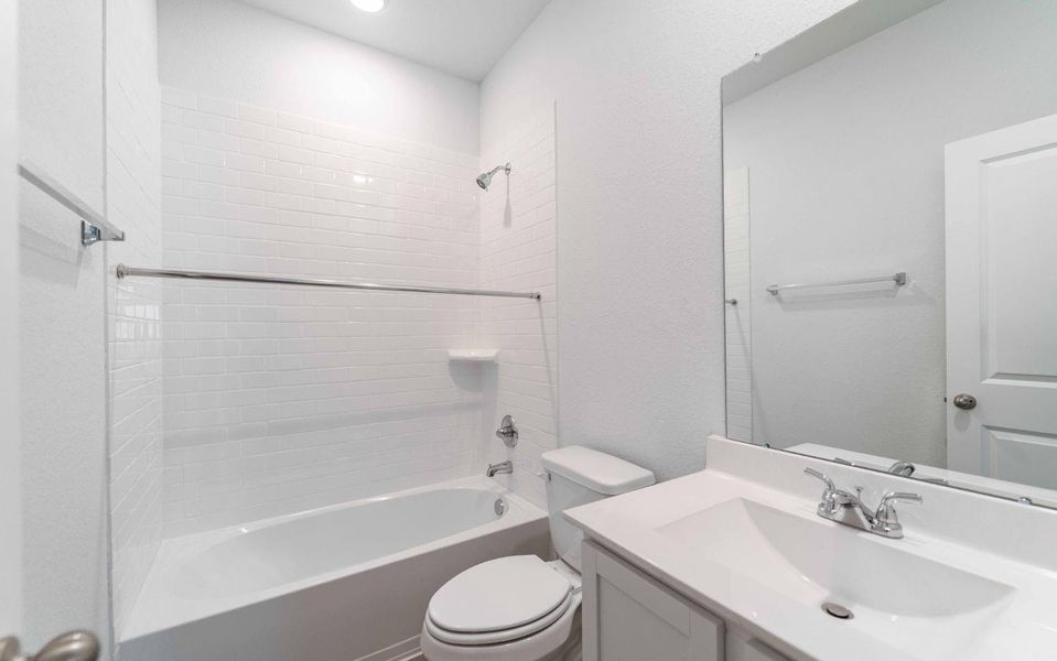 Furnished interior view inside a new home in The Pines at Seven Coves, Willis (Image 5). Furnished interior view inside a new home in The Pines at Seven Coves, Willis (Image 5).