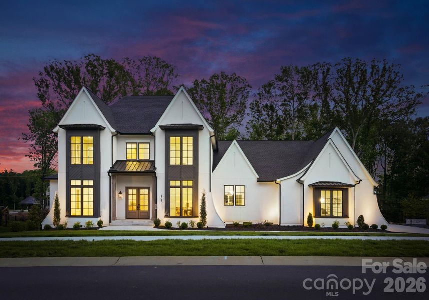 Front exterior of a new home in , Weddington, NC, highlighting curb appeal (Image 4). Front exterior of a new home in , Weddington, NC, highlighting curb appeal (Image 4).