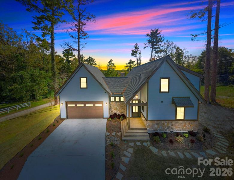 Front exterior of a new home in , Hendersonville, NC, highlighting curb appeal (Image 18).