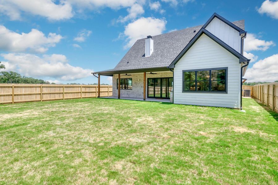Front exterior of a new home in , Somerville, TX, highlighting curb appeal (Image 22). Front exterior of a new home in , Somerville, TX, highlighting curb appeal (Image 22).