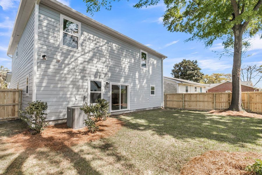 Exterior details and patio area of a home in , Charleston (Image 29).