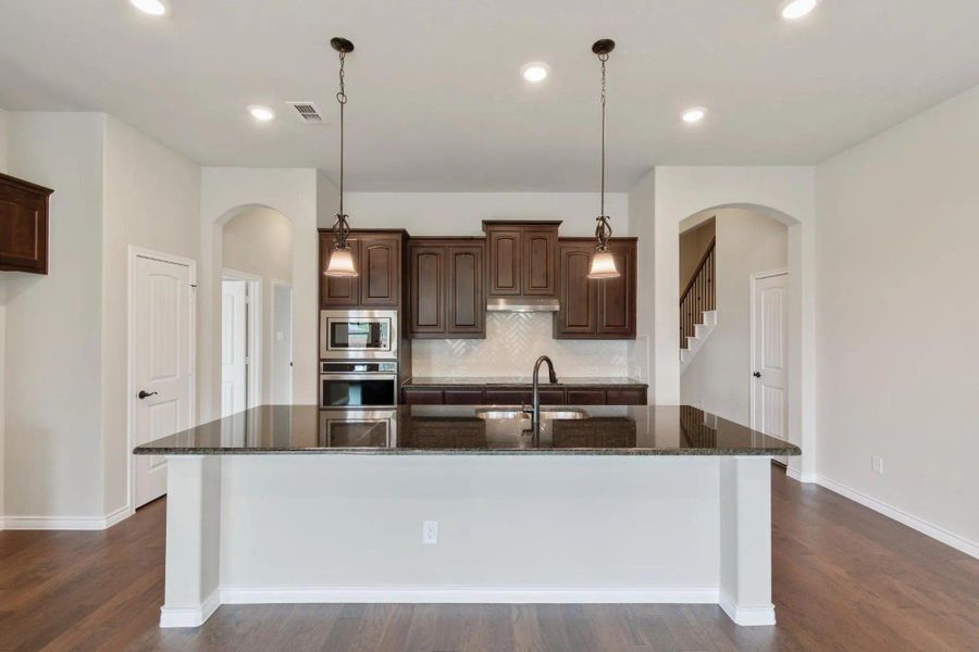 Kitchen | Concept 2671 at Mockingbird Hills in Joshua, TX by Landsea Homes