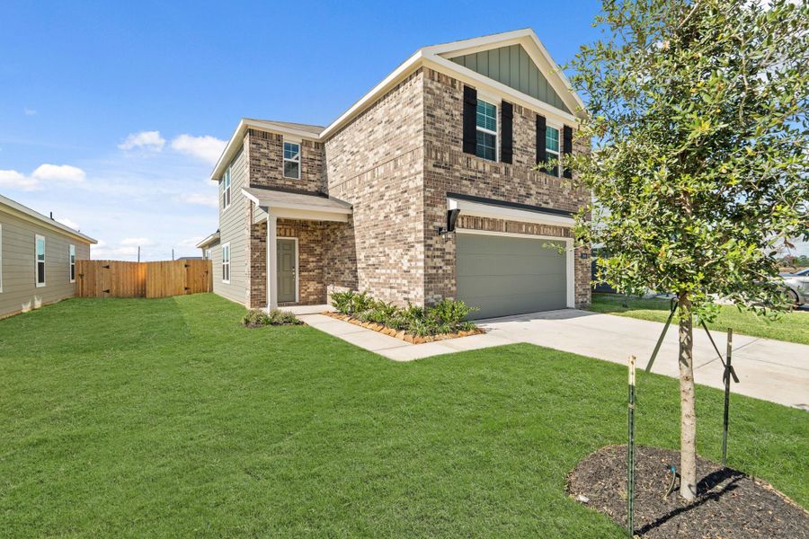 Front exterior of a new home in Laurel Farms, Brookshire, TX, highlighting curb appeal (Image 19). Front exterior of a new home in Laurel Farms, Brookshire, TX, highlighting curb appeal (Image 19).