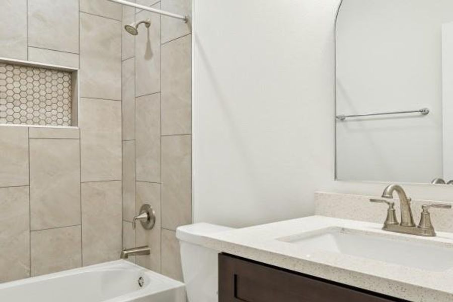 Modern tub-shower combo for versatile bathing options. Modern tub-shower combo for versatile bathing options.