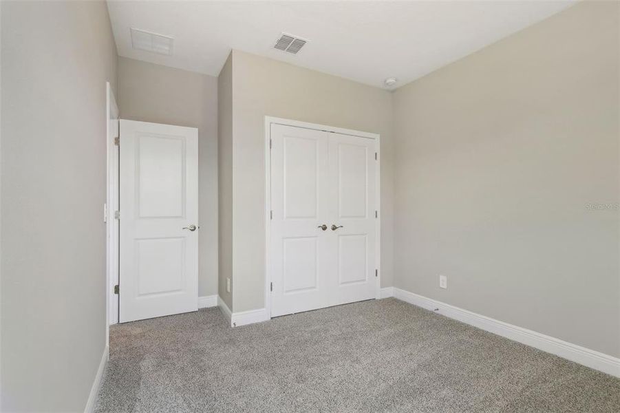 Spacious, unfurnished interior of a new home in Silverleaf Reserve Bungalows, Winter Garden (Image 29).