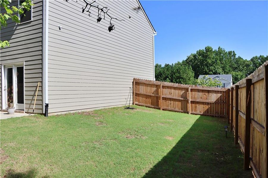 Front exterior of a new home in , Atlanta, GA, highlighting curb appeal (Image 18).