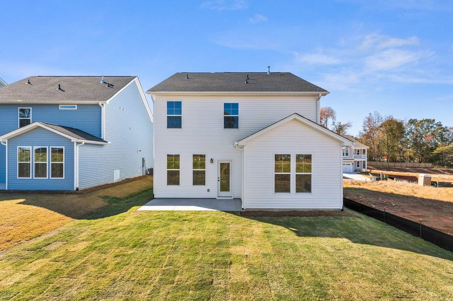 Exterior details and patio area of a home in Landmark Commons, Boiling Springs (Image 4).